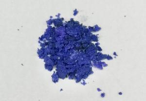 A blue colouring dispersed in maltodextrin, its carrier
