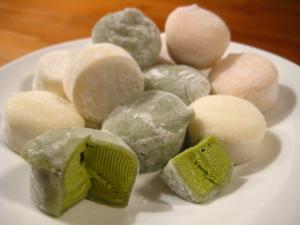 Mochi ice cream, cut open to show the chewy mochi wrapper