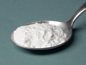 A spoonful of baking powder, a common leavening agent
