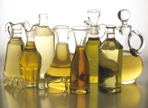 Glass bottles of different vegetable oils